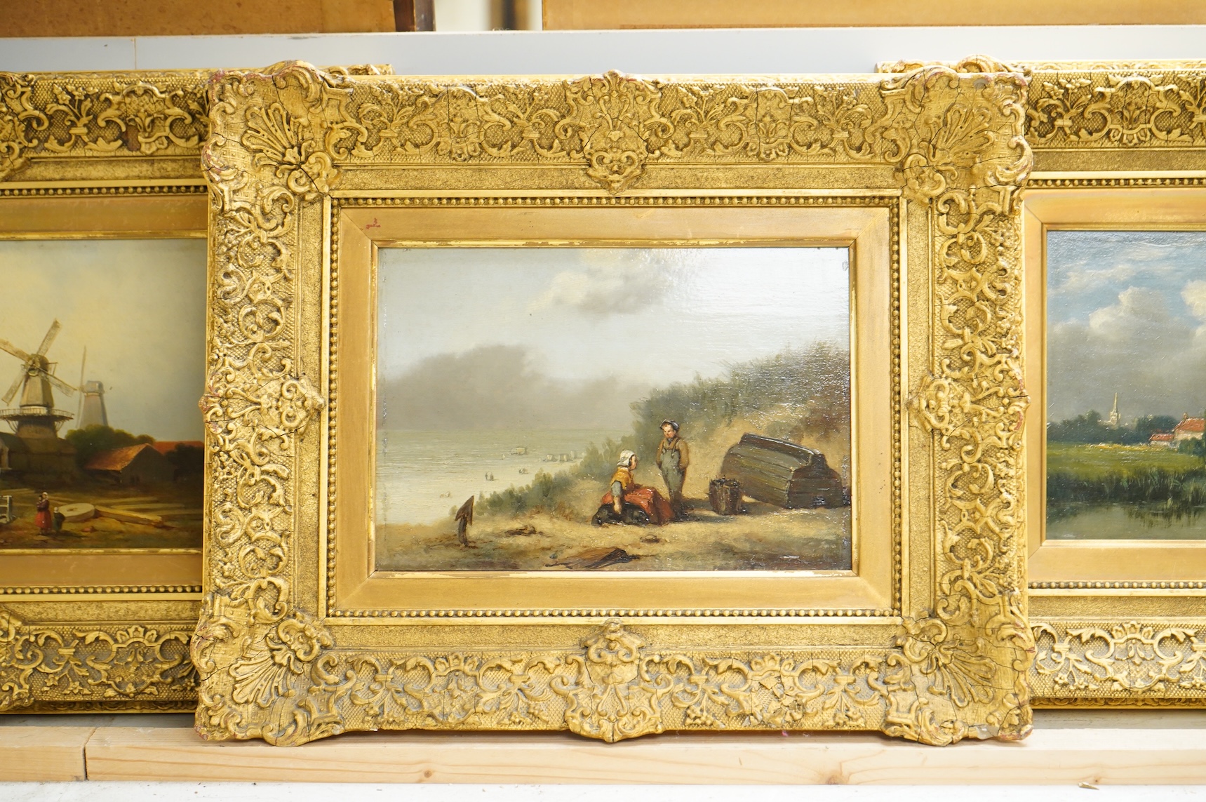 20th century, Dutch school, Beach scene, windmill and riverscape, set of three oils on board, ornate gilt framed, 16 x 22cm